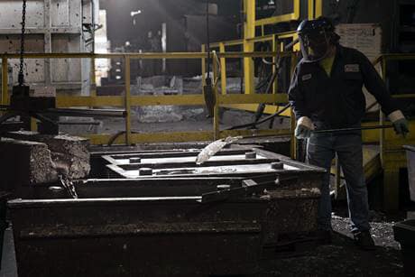 Ritchey Metals employee working in a facility.